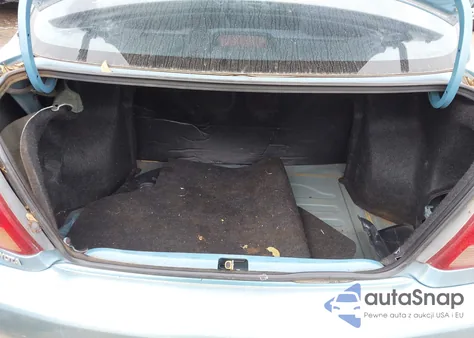 2002 Toyota Echo из США, поврежденный, VIN JTDBT123720237603